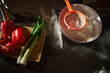 © Taras Grebinets - Kitchen Prep With Flour, Knife, Red Peppers, Tomatoes and Green Onions on Wooden Counter