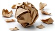 © lililia - A crumpled ball of brown paper sits on a white surface, showcasing the texture and form in high-quality detail under bright lighting