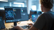 © Fox - Young software developer working on artificial intelligence algorithms and data visualization in a modern office. Focused programmer coding innovative machine learning solutions on a large monitor