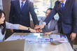 © Panumas - Group of business peoples meeting and join hands in office. Team work for success concept. Selected focus