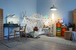 © Pixel-Shot - Interior of children's room with bed, study table and glowing lamps in evening