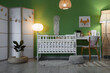 © Pixel-Shot - Interior of children's room with crib, table and glowing lamps in evening