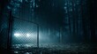 © Rijal - Cinematic night scene of car headlight beam shining through fog and chain link fence in dark forest for mystery thriller concept
