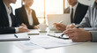 © Watcharapong - Financial Chart Papers On Table on Desk Professional Workplace Communication in a modern office, Close Up in a business environment