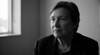 © Sarah - Senior Woman Portrait In Thoughtful Pose Looking Off Camera In Black And White