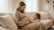 © Jian - Mother's Day pregnant woman with toddler daughter touching belly expressing sibling anticipation love for parenting lifestyle magazine editorial content photography