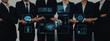 © InfiniteFlow - A professional business team stands confidently in suits, showcasing digital interface elements that represent technology and data analysis for future growth. Trope