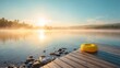 © backup_studio - Yellow inflatable swim ring on wooden pier at misty lake during sunrise. Serene morning landscape with fog over water. Summer vacation, relaxation and travel recreation concept scene.