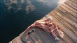 © backup_studio - Scarf and sunglasses on wooden pier at lake. Summer vacation by water. Resting on dock during sunset. Leisure, travel and relaxation concept. Coastal scenery for tourism background.