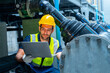 © CandyRetriever  - Industrial worker using laptop inspecting pipeline system in factory environment for maintenance and engineering operations technical inspection industrial monitoring troubleshoot process safety work