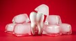 © Dissanayaka - Tooth with ice cubes on red background