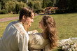 © Anna - Wedding. Beautiful romantic moments of intimacy between the bride and groom in the park. A sensual and tender shot of a man and woman in love