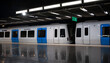 © Denis Rozhnovsky - A modern white and blue metro train sits at a polished station platform with bright overhead lighting and floor reflections in Stockholm.