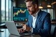 © Yuliia - Man in a contemporary office setting, utilizing technology to track stock exchange trading app and pointing at profit statistics on screen.