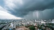 © Emilio - Massive storm cloud over city with lightning and rainfall. Extreme weather over urban landscape, dark sky, heavy clouds and approaching thunderstorm