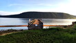 © nikiteev - Old wooden pier with caution on russian language - Enter is prohibited. Beautiful river on background