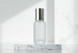 © takayuki aoyama - Elegant blank cosmetic bottle mockup on a round marble platform