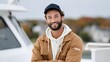 © slotzstock - Smiling man in casual outdoor clothing with young man portrait outdoors