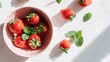 © Marry93 - Pastel spring flat lay with fresh strawberries in a soft pink bowl, scattered mint leaves, clean white surface, bright natural lighting