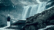 © RooM The Agency - Rear view of a young Woman in warm clothing standing in front of Skogafoss waterfall on a winter day, Iceland