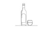 © Ade - Bottle and glass of whiskey drink.
