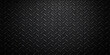 © Md Sharifujjaman - Black diamond plate metal texture background, dark steel tread pattern with raised rhombus design, rugged industrial chrome surface for construction and design