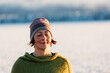 © Louise Forslycke Garbergs/Stocksy - Close-up of woman meditating in winter light