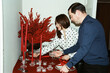 © Ayuna Production/Stocksy - Setting the festive holiday table