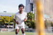 © Jovo Jovanovic/Stocksy - Soccer player warming up on the field