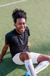 © Jovo Jovanovic/Stocksy - Happy athlete taking a break