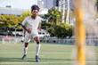 © Jovo Jovanovic/Stocksy - Young athlete sprints on the field.