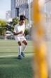 © Jovo Jovanovic/Stocksy - Soccer player practices drills on the field
