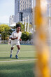 © Jovo Jovanovic/Stocksy - Rugby player sprinting on field