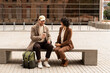 © Alba Studio/Stocksy - Coworkers Coffee Break Outdoors