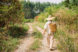 © ChaoShu Li/Stocksy - Chinese male farmers go to rural orchards to pick oranges.