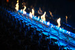 © Yakov Knyazev/Stocksy - Wine Glasses Lined Up Beside Modern Fireplace