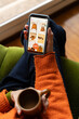 © Alba Studio/Stocksy - Senior woman online shop