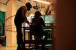 © DC Studio - Online criminals analyzing script codes to hack government system, attacking sensitive sever and causing security breach. People hacking network and stealing information at night.