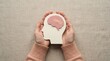 © AspctStyle - Mental health healing concept with paper brain and bandage held in hands. Psychology therapy, trauma recovery and emotional wellness support for psychiatric care.