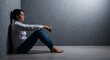 © Lorraine - A weary profile leans against a wall, sitting in heavy silence, portraying profound inner fatigue and stillness in a soft indoor light, still, fatigue, silent