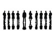 © mian - Professionals stand in a row with their reflections visible below, representing a diverse corporate team united in a business setting while maintaining a clean and modern aesthetic appearance.