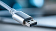 © Nataliya - Silver USB connector plugging into a port close-up, digital connectivity concept, tech hardware photography, with copy space