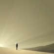 © Ahmad - A man in a suit stands alone on a desert hill at sunset