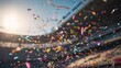 © AndyAziz - Colorful confetti falling in the air at an outdoor football stadium