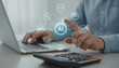 © Md - Professional accountant utilizing artificial intelligence software on laptop with business icons for automation.