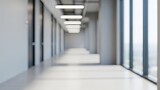 A long, bright and modern office hallway with windows and doors