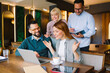 © djile - Coworkers discussing business ideas during teamwork video call