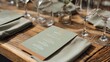 © backup_studio - Printed menu card on elegant rustic wooden restaurant table with glass and napkin. Dining setting for wedding or reception celebration. Luxury gastronomy event planning and hospitality.