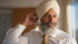 © forenna - Indian Sikh man in turban adjusts his dastar in office bathroom mirror before returning to corporate meeting, professional identity faith expression workplace, South Asian business professional reli