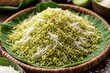 © vxnaghiyev - Authentic Vietnamese green rice flakes made from fresh sticky rice and coconut shreds